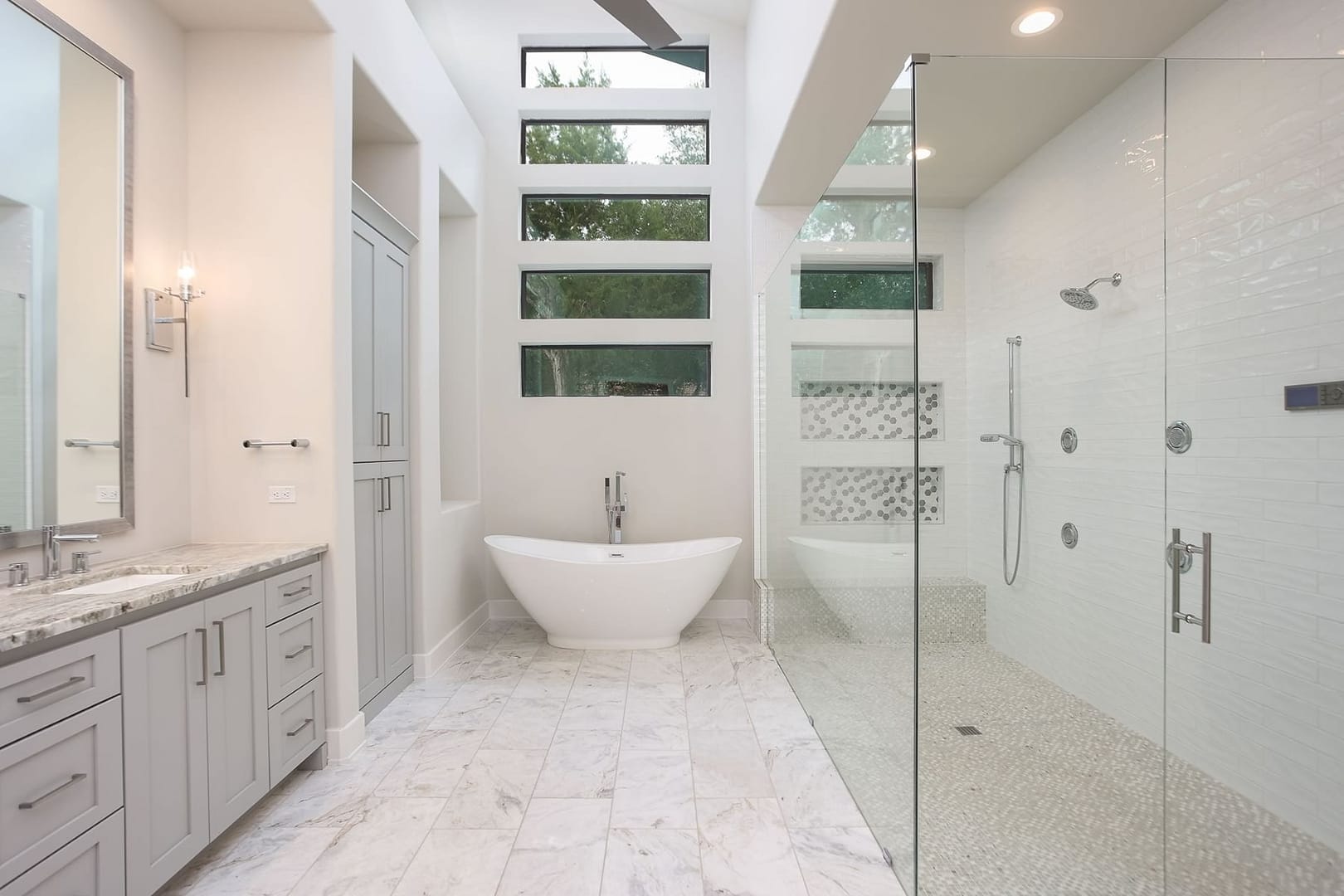 soaking tub and glass shower